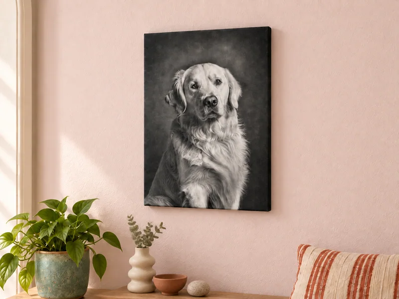 A monochrome retriever canvas on a pale blush wall, above an oak bench with ceramics and a green plant.